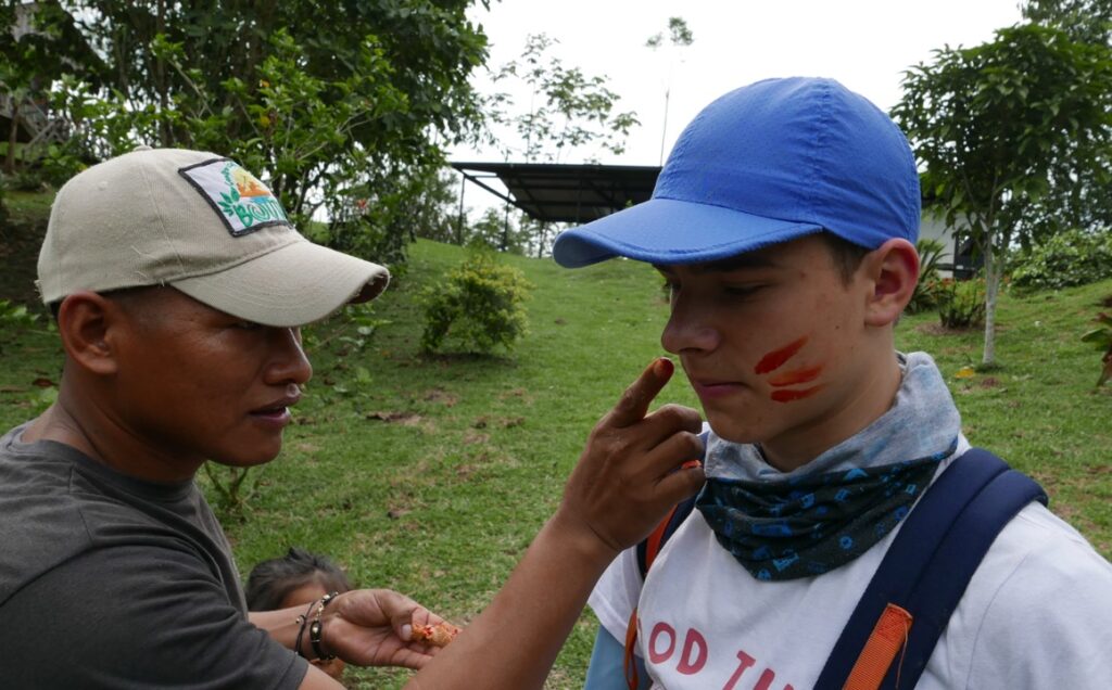 Guide John shows how the Yaguar use achiote dye for face markings. Photo: Steve Hide