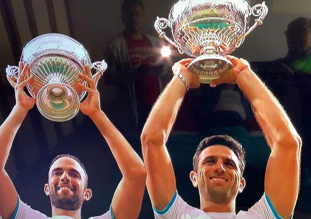 Cabal and Farah with the Wombledon title