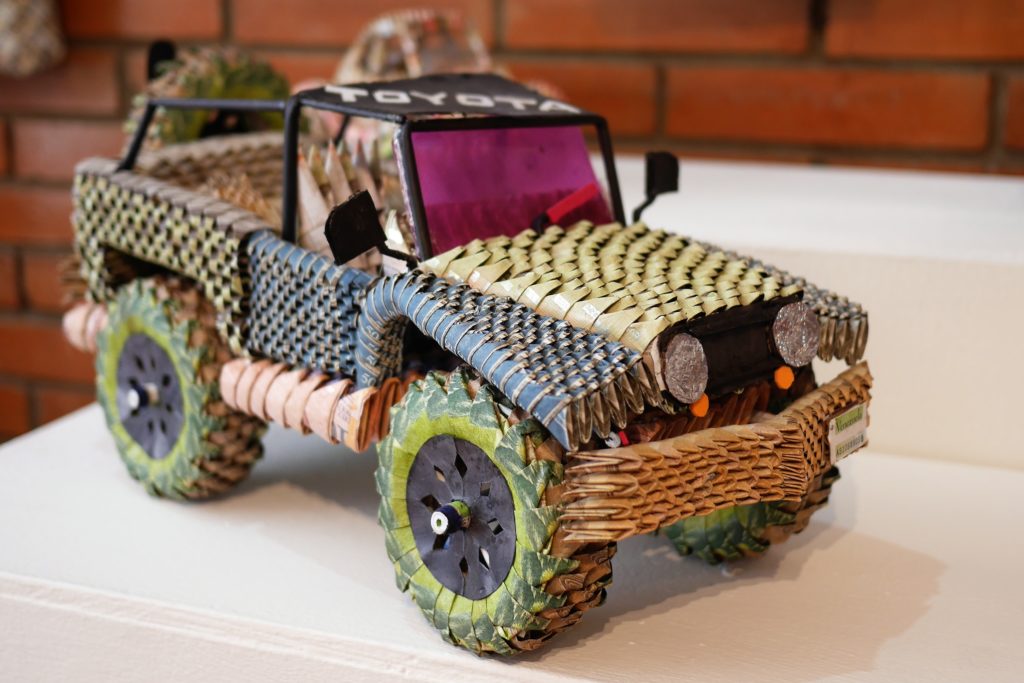 Bankrolling: a carefully crafted car made of bolivar notes. Even the wheels turn. Photo: Steve Hide.