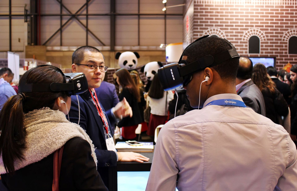 students wear VR headsets at a VR conference the