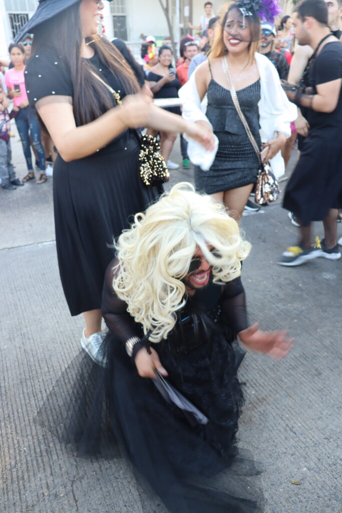 The parade of widows mourning Joselito at Barranquilla carnival.