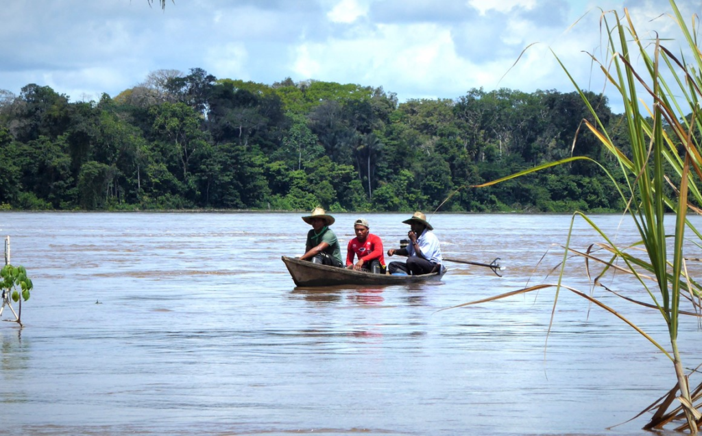 Community leaders traveling on the Putumayo River, a region where land defenders are constantly under attack by armed groups. Photo: Steve Hide