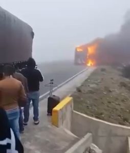 A public bus burnt by armed men on a highway on May 12th. Photo: X